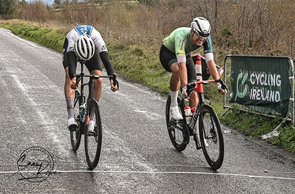 Conn McDunphy, APS Pro Cycling by Team Cadence Cyclery takes the 2026 Des Hanlon Memorial by the finest of margins ahead of Liam Crowley, Pinergy Orwell Wheelers. 