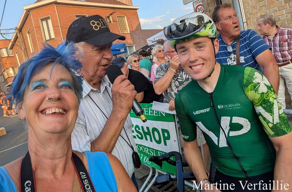 Jack Conroy, Velo Performance U23 Development Team, with photographer Martine Verfaillie at his post race interview in Moorslede.