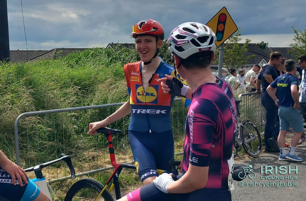Liam O'Brien debriefs with Adam Rafferty, Hagens Berman Jayco, after the 2025 Irish Men's National Road Race Championships with Liam O'Brien.