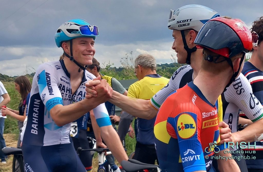 Seth Dunwoody congratulates Rory Townsend after the 2025 Irish Men's National Road Race Championships with Liam O'Brien.