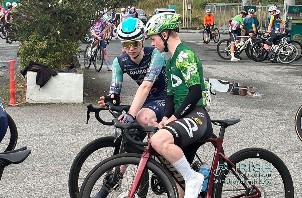 2026 Junior Tour Of Ireland winner, Rían Mc Crystal, Cannibal - Victorious U19 Development Team, in discussion with Christopher Marshall, Velo Performance U23 Development Team.