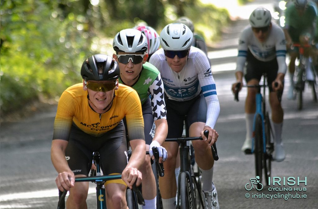 Dean Harvey (McConvey Cycles), Killian O'Brien (Team Skyline), and Matthew Walls, APS Pro Cycling by Team Cadence Cyclery, applying the pressure on the climb.