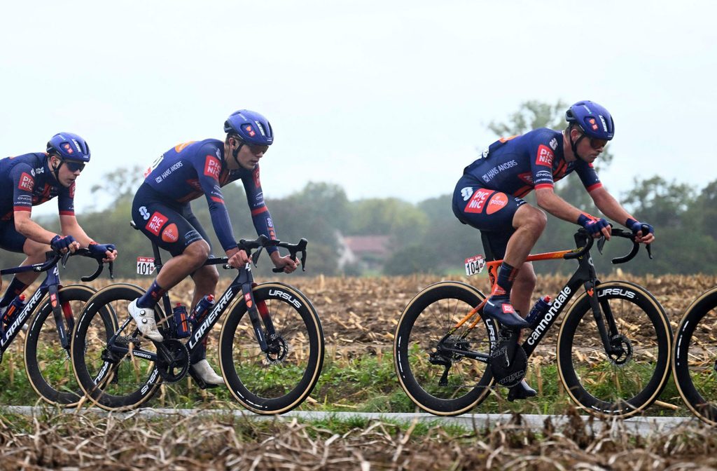 Dillon Corkery, Team Picnic PostNL, with teammates Pavel Bittner and Casper Van Uden at the 2025 Gooikse Pijl. 