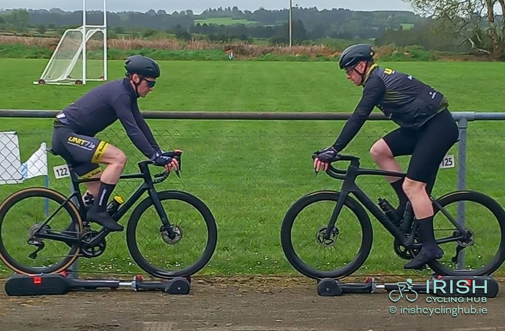 Bryan McCrystal warms up with Unit 7 Castlebar CC teammate David Gordon (122) ahead of Stage 2 of the 2026 Rás Tailteann.