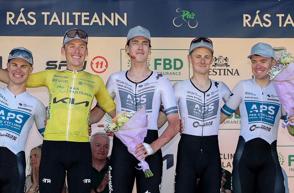 Conn McDunphy, Yellow Jersey, with his APS Pro Cycling by Team Cadence Cyclery teammates and a banged and bruised Cian Keogh.