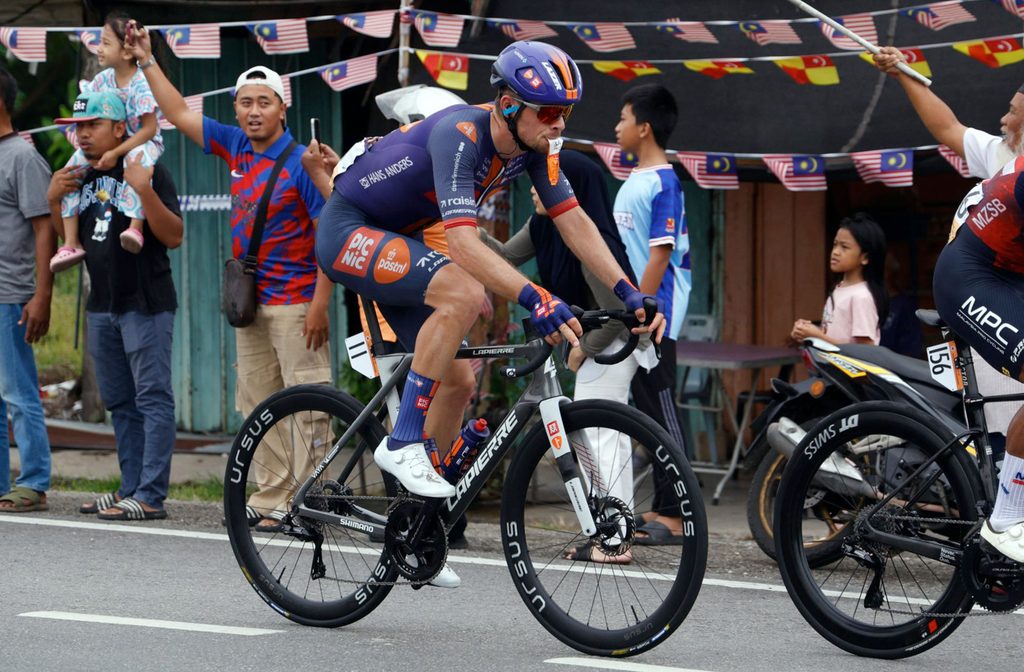 Dillon Corkery takes a gel during Stage 1 of the 2026 Petronus Tour de Langkawi.
